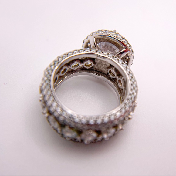 Round cut cubic zirconia silver toned ring with round accents. Size 5. - Picture 6 of 14